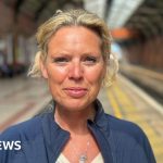 A group of women discussing lobular breast cancer research in an office.