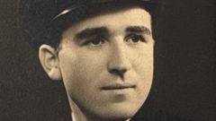 Family members honor Navy veteran Frank Chester at a memorial gathering.