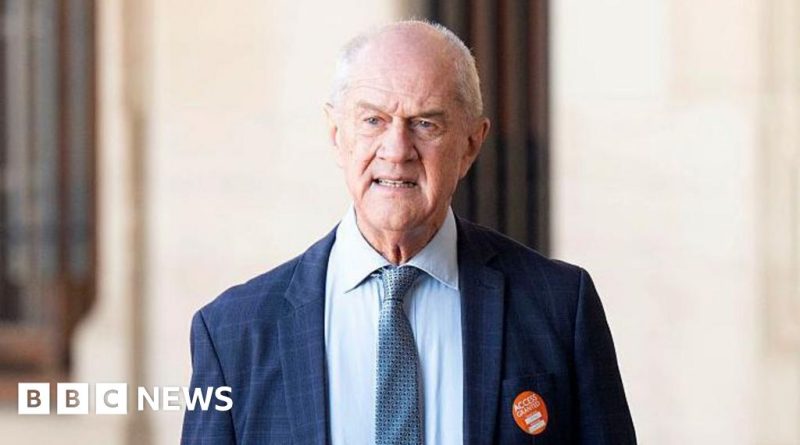 A diverse group of professionals discussing diplomatic matters, representing the new ambassador to US.