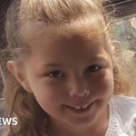 A courtroom depicting a serious atmosphere where criminals attend sentencing hearings.