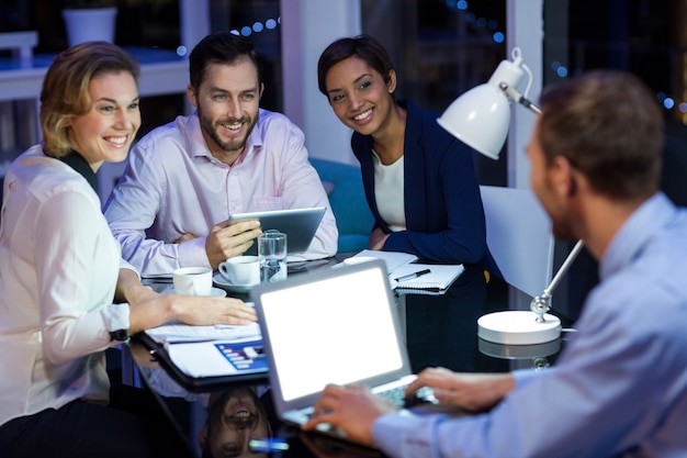 A group discussing subscription cancellations in a professional setting.