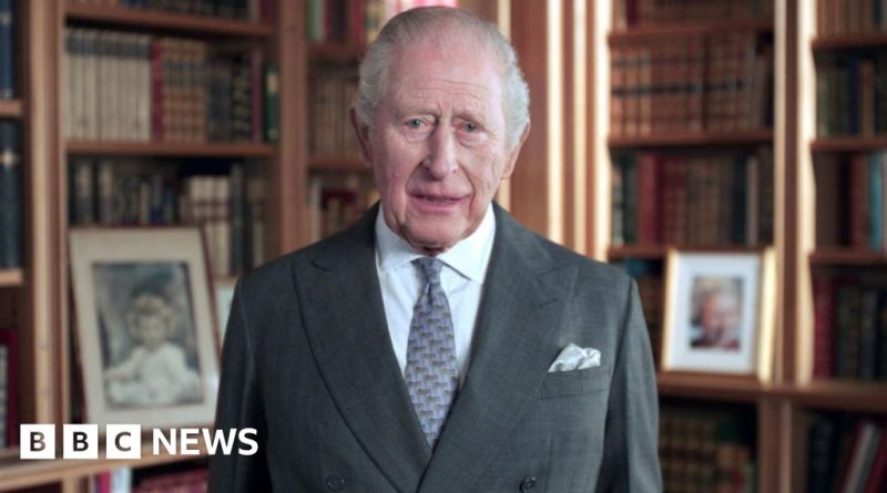 Visitors admire the new Queen Elizabeth statue during its unveiling ceremony.