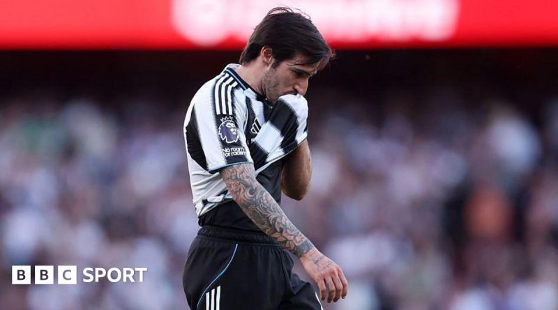 Newcastle relegation threat as players discuss strategies on the field.