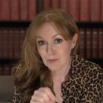 Healthcare professionals discussing NHS challenges after election results in a modern hospital.