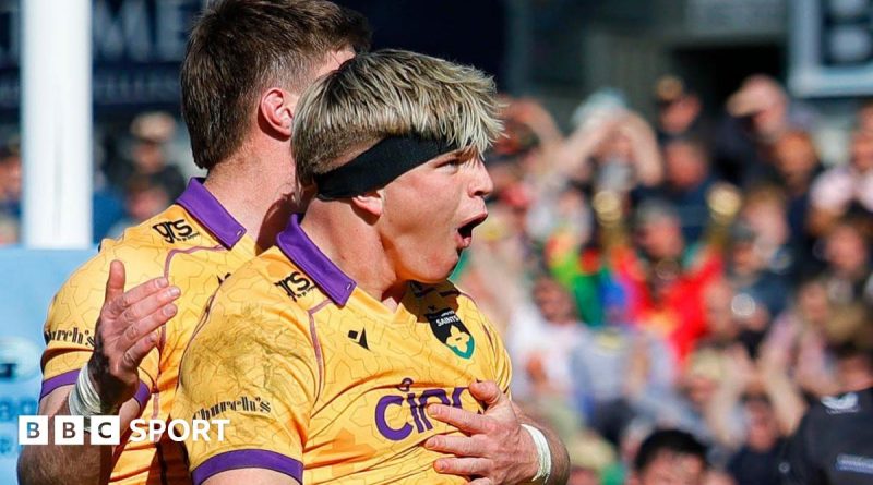 Northampton Exeter match with players celebrating a last-minute victory.