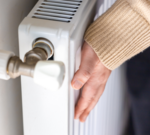 Professionals discuss Northern Ireland energy prices in a meeting.