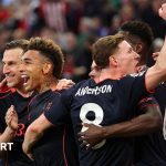 Nottingham Forest players planning tactics for their Europa League match.