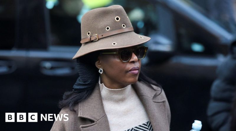 Oil executives in a serious meeting discussing bribery allegations.