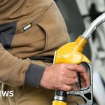 Business professionals engaged in US-Iran peace talks discussion.