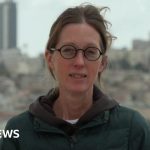 Meeting about the Lebanon ceasefire with professionals discussing tensions.