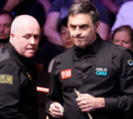 O'Sullivan Higgins match in progress with players focused on the game.