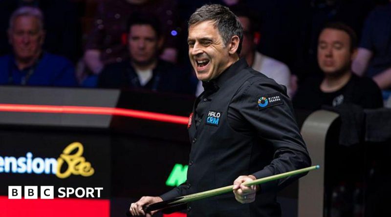 A focused player in a snooker match at the Crucible Theatre, illustrating the World Championship title defense.