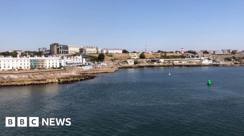 A business meeting discussing Plymouth rent prices and housing challenges.