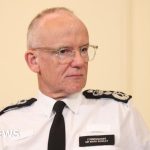 Police chief defends officers at a press conference about a knife incident.