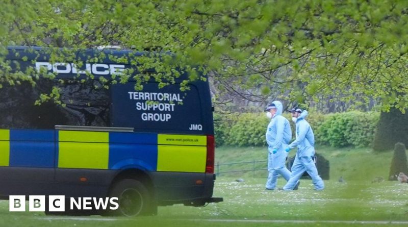 Emergency responders assess non-hazardous items near the embassy.