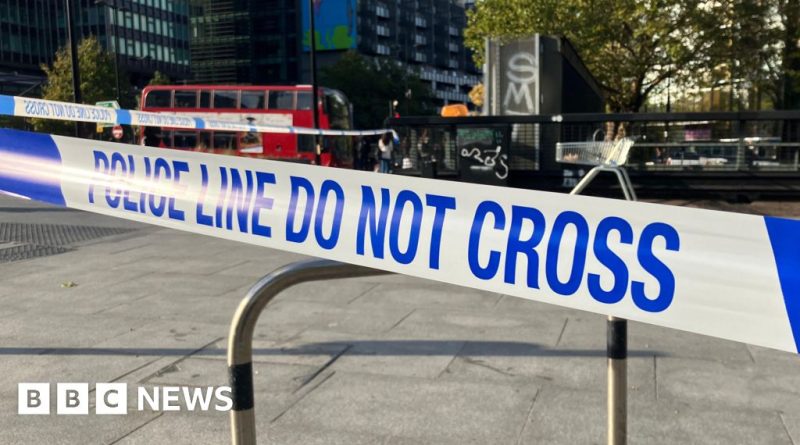 Police officers discussing the tragic incident involving police officers charged in a fatal crash.
