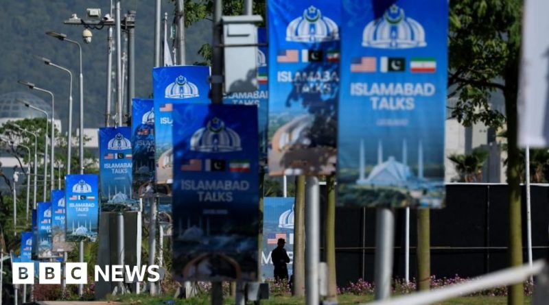 Professionals in conservative attire discussing plans for Islamabad peace talks.