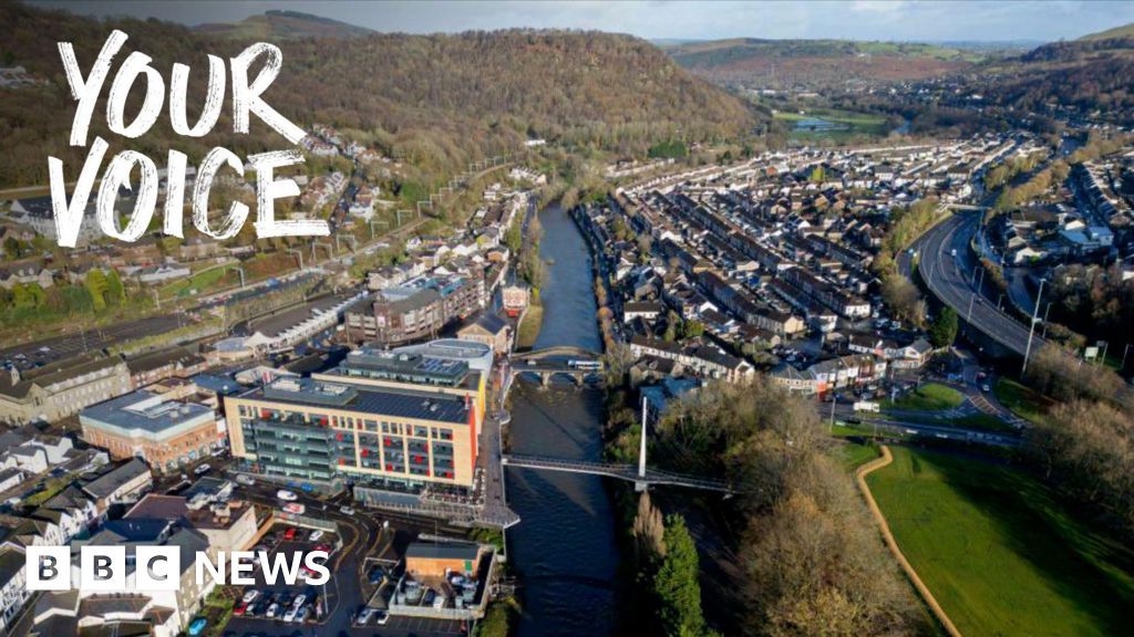 Professionals discussing public concern for net zero emissions in a modern office.