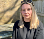 Women discussing adenomyosis awareness in a supportive environment.