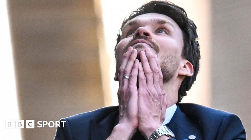 Rangers must win match against Hearts, players strategizing on the sidelines.