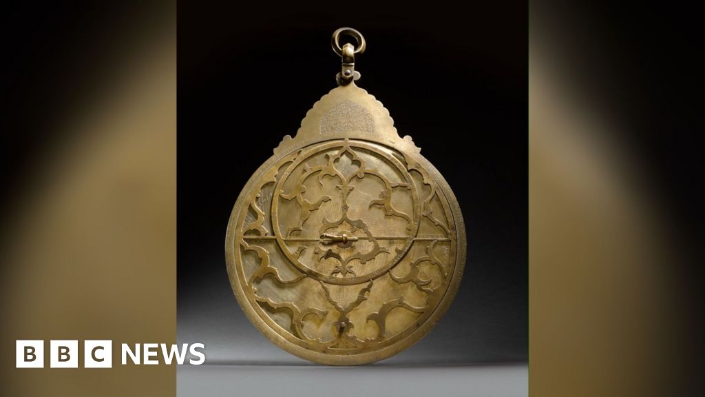 A large 17th century astrolabe ready for auction, showcasing its intricate design.