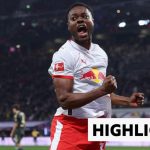 RB Leipzig players celebrating a victory in a soccer match.