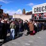 A lively snooker match at the 2026 World Snooker Championship with focused players and cheering fans.
