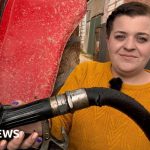 Farmers discussing the impact of rising red diesel prices in a field.