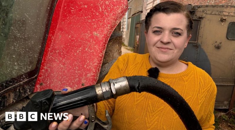 Farmers discussing the impact of rising red diesel prices in a field.