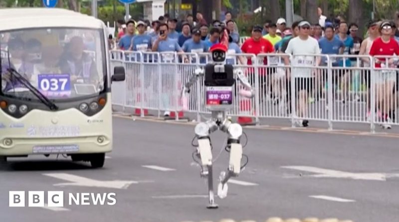 Robots and human runners compete in the Beijing half marathon.