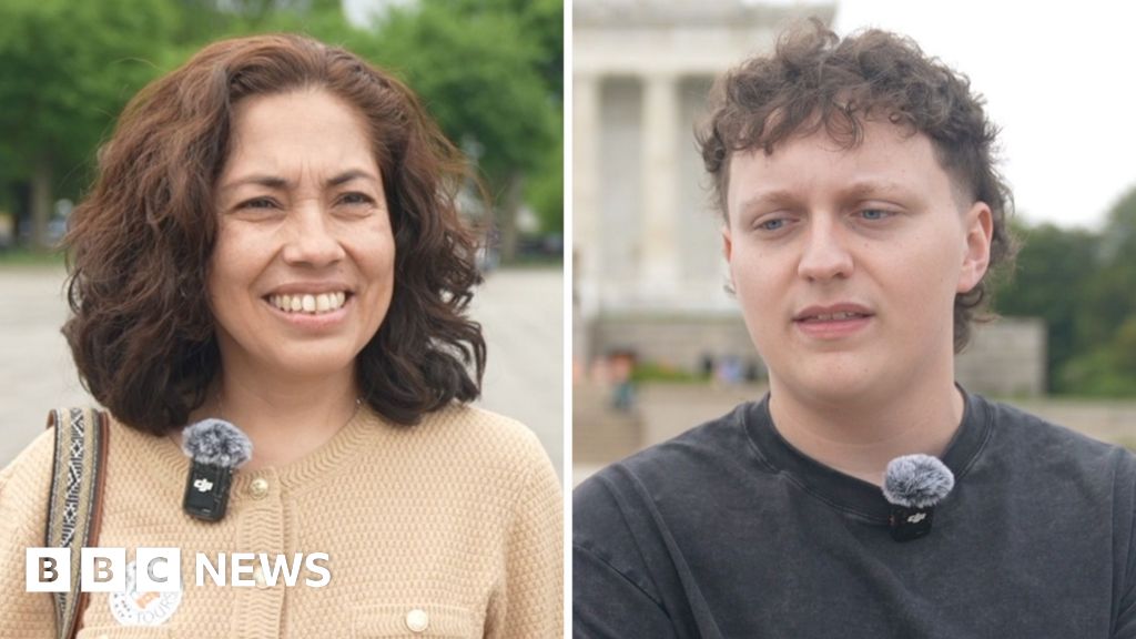 Diverse group enjoying gelato in a park during the King Charles US visit.