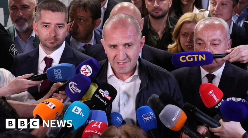 Professionals discussing Bulgarian elections in a serious meeting.