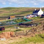 Farmers discussing agricultural issues in Scotland's rural community.