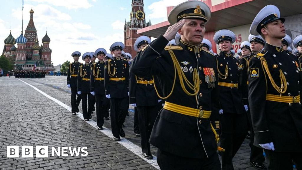 Crowd gathered for the Victory Day parade in Moscow, emphasizing the event's solemnity and history.