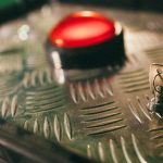 Diverse group of gamers collaborating to prevent a nuclear threat in a virtual game.