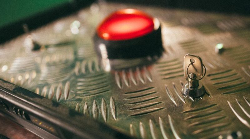 Diverse group of gamers collaborating to prevent a nuclear threat in a virtual game.