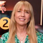 A diverse team in a radio studio planning the Sara Cox Radio 2 breakfast show.