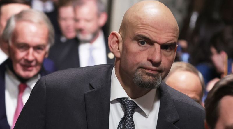 Senator John Fetterman discusses depression in a supportive professional setting.