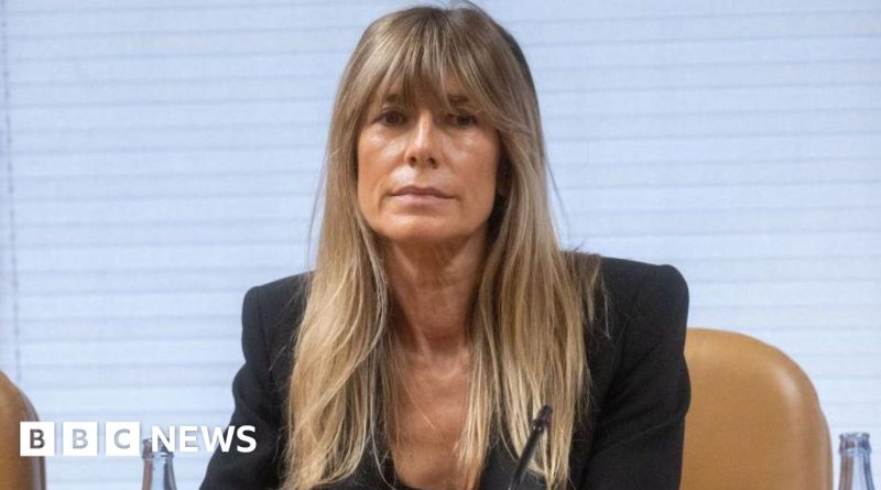 A serious business meeting discussing Begoña Gómez corruption charges.