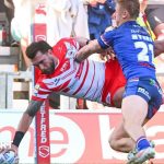 St Helens Super League victory scene with players in action on the field.