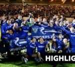A group of football players celebrating their Scottish Championship title win.