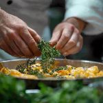 Stanley Tucci Searching for Italy scene in a lively Italian restaurant.