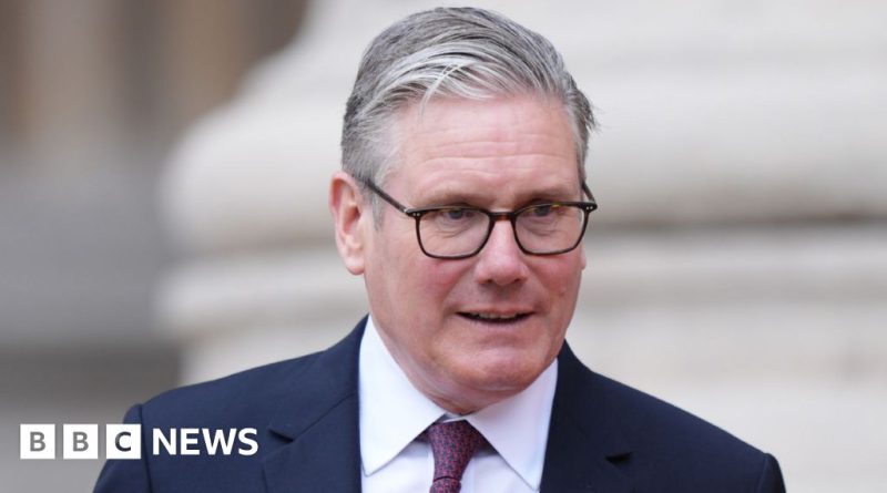 Group of politicians discussing Starmer Robbins comments in formal attire.