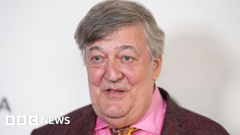 Stephen Fry legal action focus keyword highlighted at a tech conference scene.