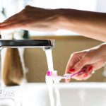 Professionals in conservative attire discussing Stormont revenue increase strategies in a modern office.