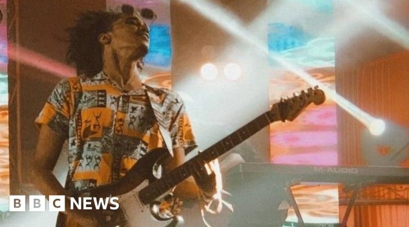 Sudanese band performing in a studio, showcasing resilience through music.