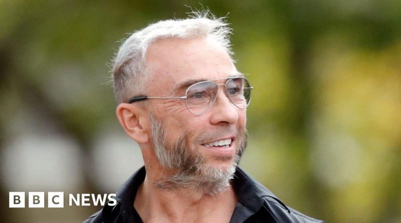 A courtroom scene depicting professionals discussing the Superdry co-founder trial.