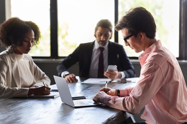 A serious meeting about postal worker Sunday rights in a professional setting.