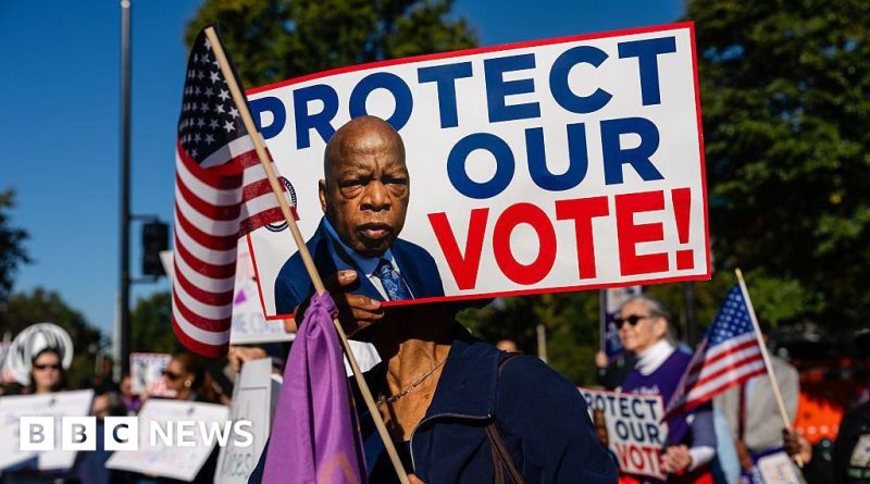 Diverse professionals discussing electoral maps in a bright office setting.