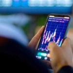 Professionals discussing insider trading related to the Iran war.